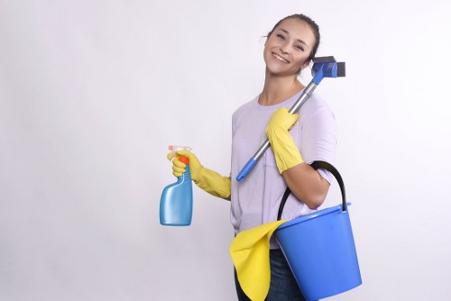 Inspecting a rug for stains and wear before cleaning